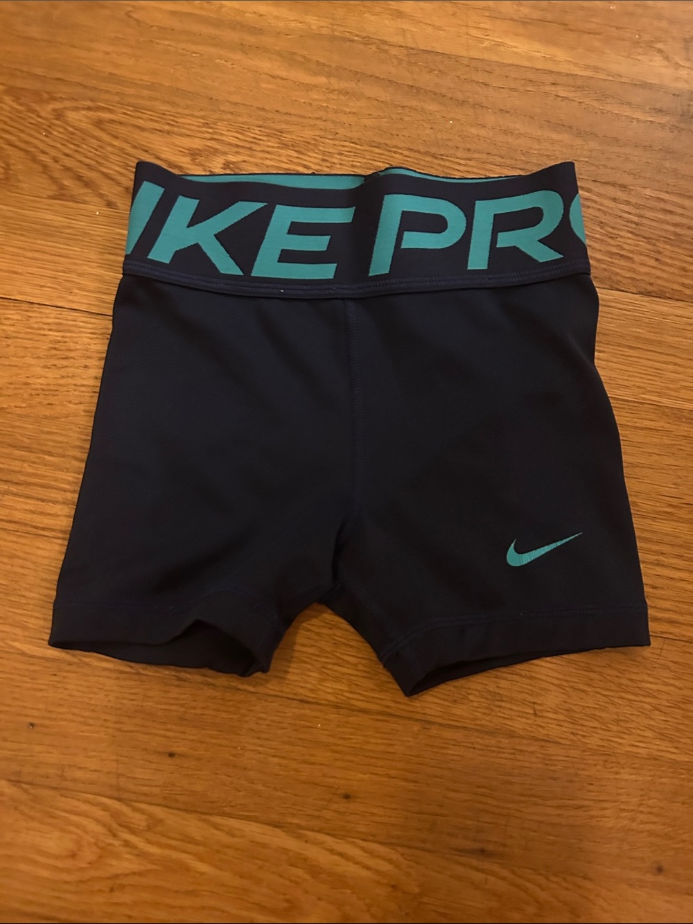 Nike Black Compression Shorts with Teal Accents